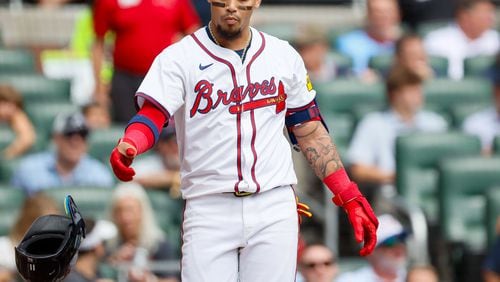 Atlanta Braves shortstop Orlando Arcia tosses the helmet after striking out during the second inning against the New York Mets at Truist Park on Monday, Sept. 30, 2024. The Braves fell 8-7. (Miguel Martinez/ AJC)