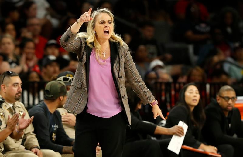 FILE - Las Vegas Aces head coach Becky Hammon calls to players during the first half of a WNBA basketball game against the Washington Mystics, Thursday, July 4, 2024, in Las Vegas. (Steve Marcus/Las Vegas Sun via AP, File)