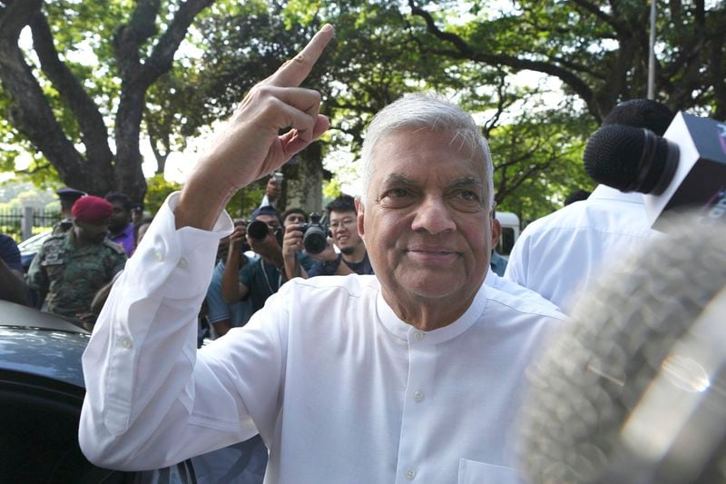 Sri Lankan president and independent presidential candidate Ranil Wickremesinghe reacts after casting his vote, in Colombo, Sri Lanka, Saturday, Sept. 21, 2024. (AP Photo/Rajesh Kumar Singh)