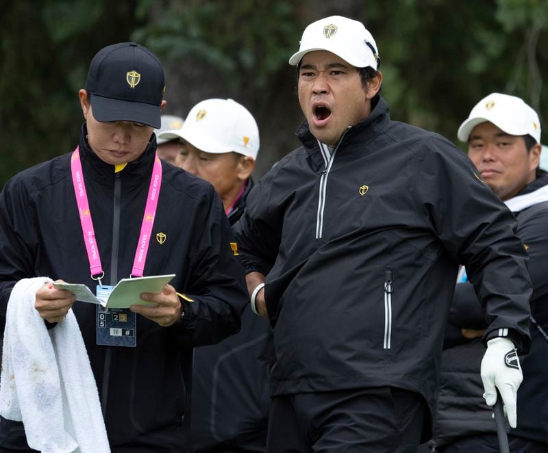 International team member Hideki Matsuyama of Japan, yawns as he waits to tee off during practice at the Presidents Cup golf tournament at Royal Montreal Golf Club in Montreal, Wednesday, Sept. 25, 2024. (Ryan Remiorz/The Canadian Press via AP)