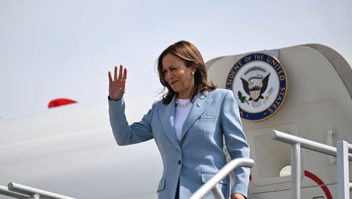 Vice President Kamala Harris greets supporters as she arrives at Hartsfield-Jackson International Airport for a rally at the Georgia State University’s convocation center in Atlanta on Tuesday, July 30, 2024. It is her first campaign event in Georgia since she became the presumptive Democratic nominee.  (Hyosub Shin / AJC)