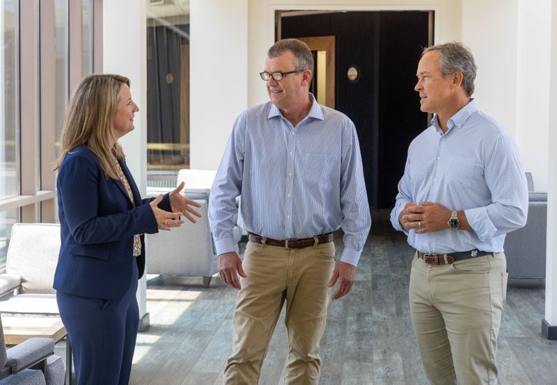 (left to right) Jodi Taylor, Kenneth Underwood & Keith Johnson chat at the Brasfield & Gorrie office in Atlanta on June 26, 2024. For Top Workplace large division story.  PHIL SKINNER FOR THE ATLANTA JOURNAL-CONSTITUTION