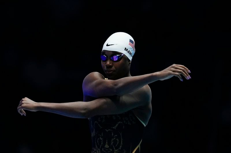 Simone Manuel stretches before a Women's 100 freestyle semifinals heat Tuesday, June 18, 2024, at the US Swimming Olympic Trials in Indianapolis. (AP Photo/Darron Cummings)
