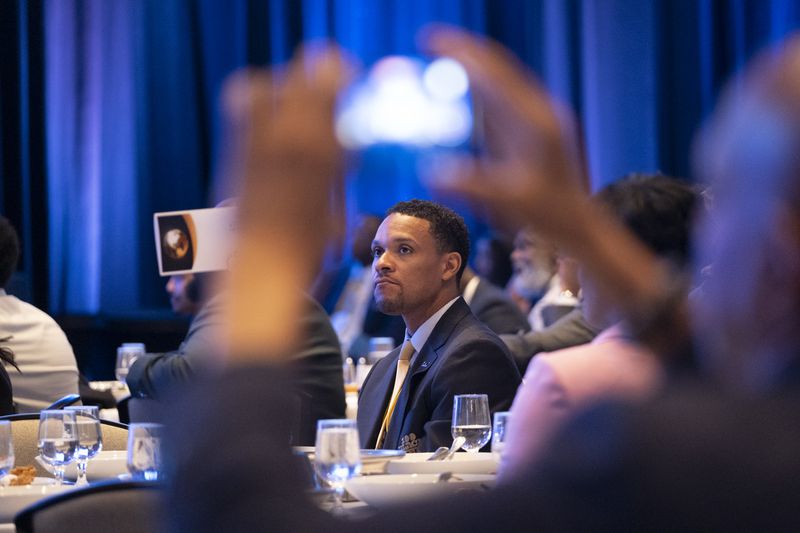 The audience watches Vice President Kamala Harris speak at the 100 Black Men of America conference  in Atlanta on Friday, June 14, 2024.   (Ben Gray / Ben@BenGray.com)