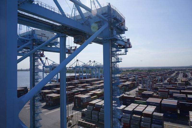 FILE - Shipping containers are stacked in the Port of New York and New Jersey in Elizabeth, N.J., May 20, 2021. (AP Photo/Seth Wenig, File)