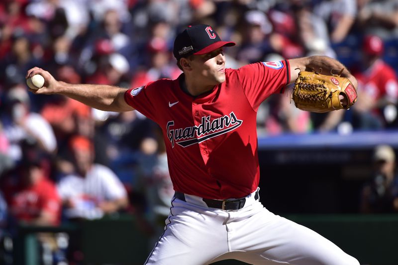 Cleveland Guardians' Cade Smith pitches in the sixth inning during Game 1 of baseball's AL Division Series against the Detroit Tigers, Saturday, Oct. 5, 2024, in Cleveland. (AP Photo/Phil Long)