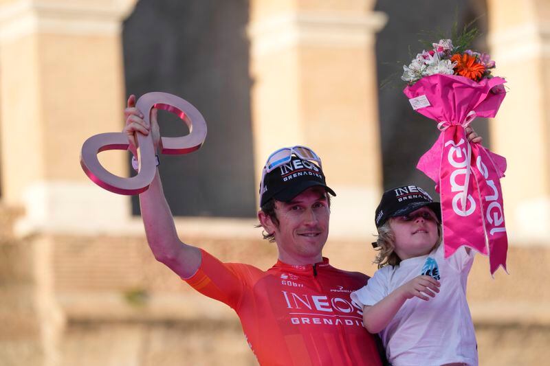 Third classified Britain's Geraint Thomas celebrates during the podium ceremony at the end of the 21st and last stage of the Giro D'Italia, tour of Italy cycling race, in Rome, Sunday, May 26, 2024. (AP Photo/Andrew Medichini)