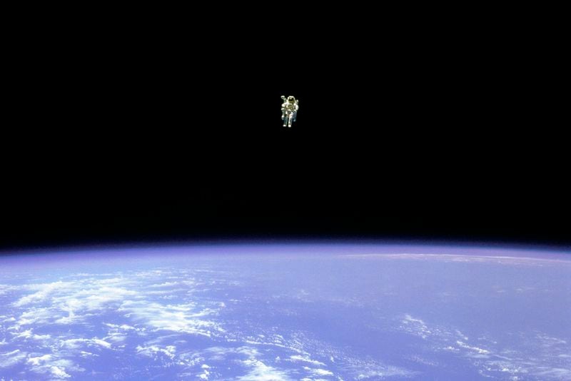 FILE - In this photo provided by NASA, astronaut Bruce McCandless uses a nitrogen jet-propelled backpack, a Manned Manuevering Unit, outside the space shuttle Challenger on Feb. 12, 1984. (NASA via AP, File)