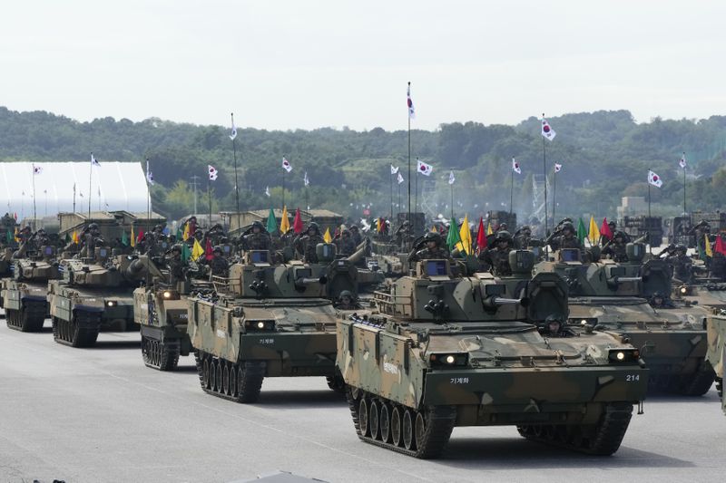 South Korean mechanized unit personnel parade with their armored vehicles during the media day for the 76th anniversary of Armed Forces Day at Seoul air base in Seongnam, South Korea, Wednesday, Sept. 25, 2024. (AP Photo/Ahn Young-joon)