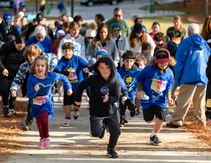 Kids take off during April's Daffodil Dash in Dunwoody.