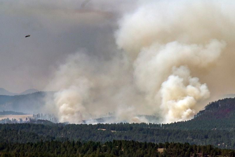 Smoke billows from the First Thunder Fire, Tuesday, Sept. 3, 2024 near Rapid City, N.D. (Matt Gade/Rapid City Journal via AP)