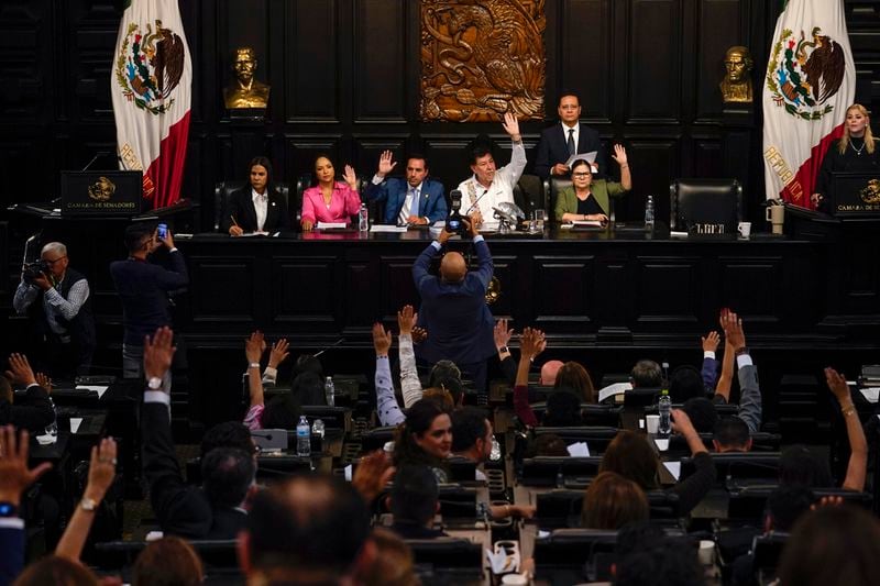 Senators hold a session to discuss judicial reform that would require all judges to stand for election, in Mexico City, Thursday, Sept. 5, 2024, one day after Mexico's lower house approved the legislation. (AP Photo/Felix Marquez)