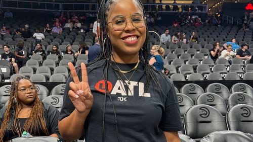 UATL's Najja Parker gets ready to take to the court — for a big announcement — at a recent Dream game.