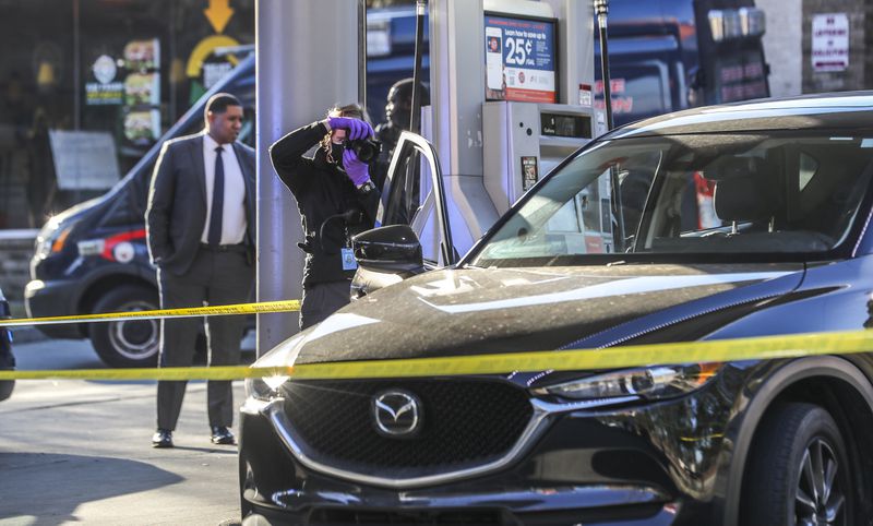Atlanta police investigated a shooting at a gas station near Mercedes-Benz Stadium on Feb. 1.


