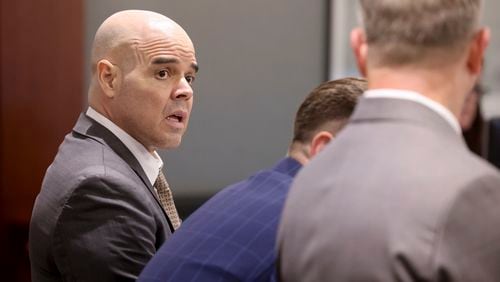 Robert Telles, left, talks with his attorneys Robert Draskovich, right, and Michael Horvath, in court prior to jury selection on the second day of his murder trial at the Regional Justice Center in Las Vegas Tuesday, Aug. 13, 2024. Telles, a former Clark County public administrator, is charged in the murder of Las Vegas Review-Journal investigative journalist Jeff German. (K.M. Cannon/Las Vegas Review-Journal via AP, Pool)