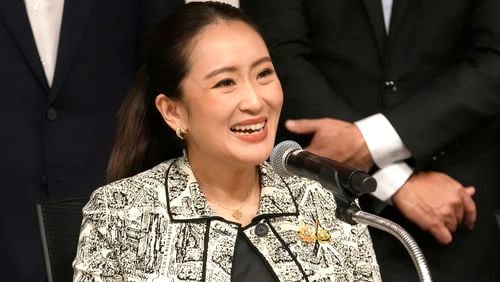 Leader of Pheu Thai Party, Paetongtarn Shinawatra, daughter of Thailand's former Prime Minister Thaksin Shinawatra, talks to reporters during a press conference in Bangkok, Thailand, Thursday, Aug. 15, 2024. (AP Photo/Sakchai Lalit)