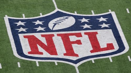 A detail of the official National Football League NFL logo is seen painted on the turf as the New York Giants host the Atlanta Falcons during their NFC Wild Card Playoff game at MetLife Stadium on Jan. 8, 2012 in East Rutherford, New Jersey.  (Nick Laham/Getty Images/TNS)