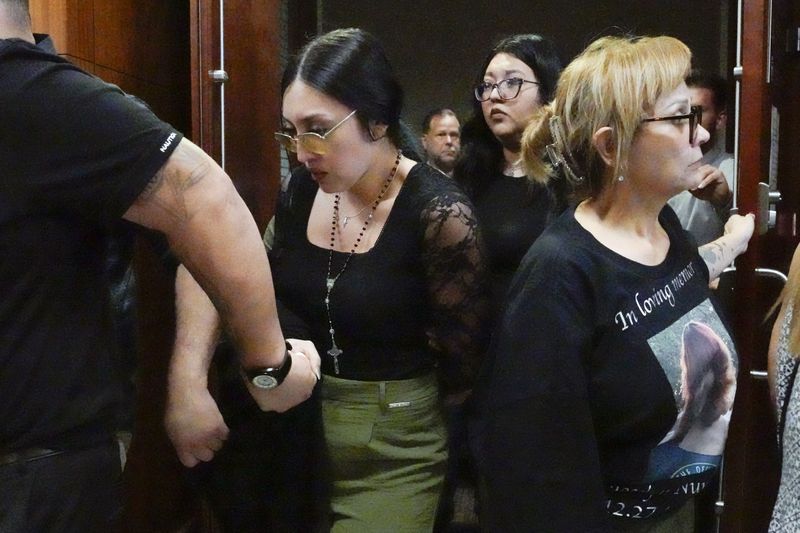 Alexis Nungaray, the mother of Jocelyn Nungaray, leaves the courtroom after Franklin Peña, one of the two men accused of killing the 12-year-old girl, appeared in court, Monday, June 24, 2024, in Houston. Peña was ordered held on $10 million bail as he and another man, Johan Jose Rangel-Martinez, are charged with capital murder over the girl's death. (Brett Coomer/Houston Chronicle via AP)
