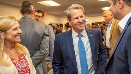 When Gov. Brian Kemp and his wife, Marty, met recently with Georgia's high school valedictorians, he said he pleaded with them to stay in the state or return after college, fearing a brain drain on the economy. The couple attended the grand opening of the new Yamaha Marine Innovation Center in Kennesaw on Wednesday, April 12, 2023. The facility is dedicated to creating the next generation in outdoor sport connected technology and is specifically recruiting local university students for engineering and technical jobs.  (Jenni Girtman for The Atlanta Journal-Constitution)