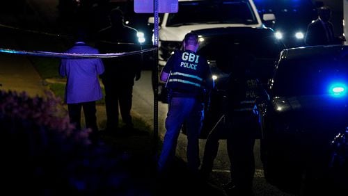 Atlanta police block a portion of Northside Drive on Saturday after an officer-involved shooting. The GBI was on the scene investigating.