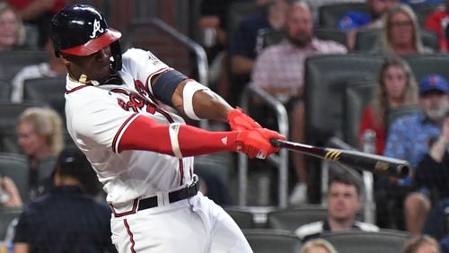 September 30, 2021 Atlanta - Atlanta Braves right fielder Jorge Soler (12) hits a solo home run in the first inning at Truist Park on Thursday, September 30, 2021. (Hyosub Shin / Hyosub.Shin@ajc.com)