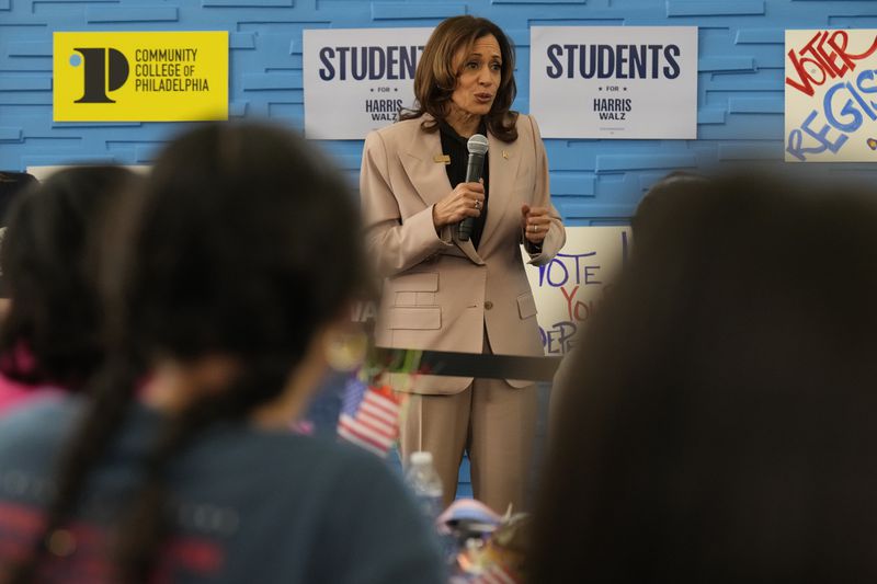 Democratic presidential nominee, Vice President Kamala Harris, center, speaking during an unscheduled stop to talk to student volunteers at Community College of Philadelphia, Tuesday, Sept. 17, 2024, in Philadelphia. (AP Photo/Jacquelyn Martin)