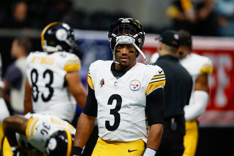 Pittsburgh Steelers quarterback Russell Wilson (3) attends warms up before an NFL football game against the Atlanta Falcons on Sunday, Sept. 8, 2024, in Atlanta. (AP Photo/Butch Dill)