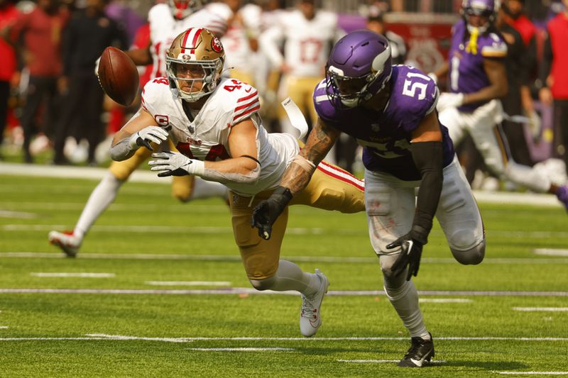 Minnesota Vikings linebacker Blake Cashman (51) breaks up a pass intended for San Francisco 49ers fullback Kyle Juszczyk (44) during the second half of an NFL football game, Sunday, Sept. 15, 2024, in Minneapolis. (AP Photo/Bruce Kluckhohn)