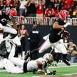 Atlanta Falcons running back Bijan Robinson (7) crosses the end zone, but a flag prevented the score during the second half of an NFL football game against the New Orleans Saints on Sunday, Sept. 29, at Mercedes-Benz Stadium in Atlanta.
(Miguel Martinez/ AJC)