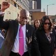 Attorney Ben Crump, left, RowVaughn Wells, right, leave the federal courthouse after three former Memphis police officers were convicted of witness tampering charges in the 2023 fatal beating of Tyre Nichols, Thursday, Oct. 3, 2024, in Memphis, Tenn. (AP Photo/George Walker IV)