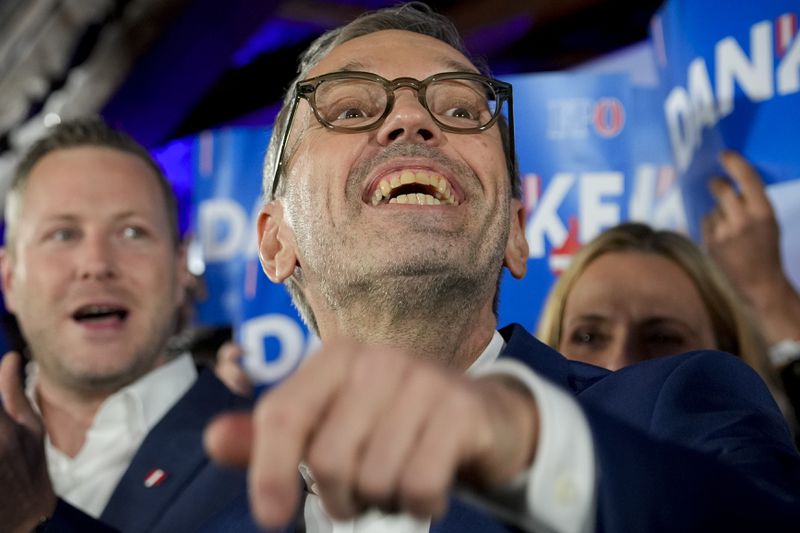 Herbert Kickl, leader of the Freedom Party of Austria waves to supporters, in Vienna, Austria, Sunday, Sept. 29, 2024, after polls closed in the country's national election. (AP Photo/Andreea Alexandru)