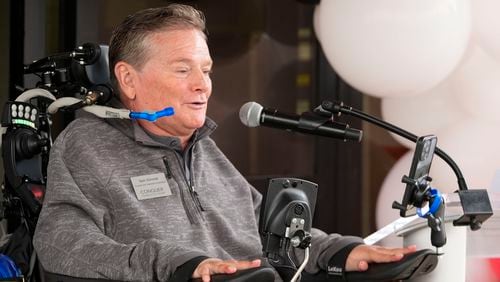 Sam Schmidt speaks during a ribbon-cutting ceremony for the not-for-profit Conquer Paralysis Now center in partnership with NeuroHope, Tuesday, Oct. 1, 2024, in Indianapolis. (AP Photo/Darron Cummings)