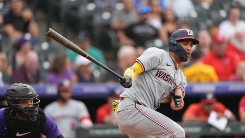 Washington Nationals' Eddie Rosario grounds out against Colorado Rockies starting pitcher Dakota Hudson to end the top of the first inning of a baseball game Friday, June 21, 2024, in Denver. (AP Photo/David Zalubowski)
