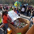 Food donations are collected fat the Nov. 4, 2022, Food-A-Thon event at the Atlanta Community Food Bank in East Point. (Jason Getz/The Atlanta Journal-Constitution)