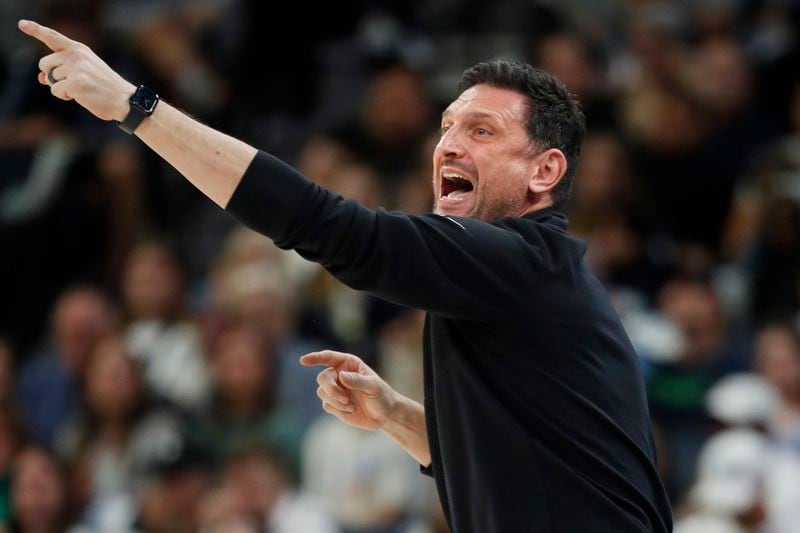 Phoenix Mercury head coach Nate Tibbetts directs his team as they play the Minnesota Lynx in the first quarter of Game 2 of a WNBA basketball first-round playoff game Wednesday, Sept. 25, 2024, in Minneapolis. (AP Photo/Bruce Kluckhohn)