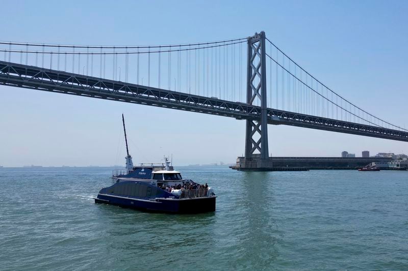 The MV Sea Change, the first commercial passenger ferry powered by hydrogen fuel cells, is seen on the water, Friday, July 12, 2024, in San Francisco. The MV Sea Change will begin offering free rides to the public along the San Francisco waterfront on Friday, July 19. (AP Photo/Terry Chea)