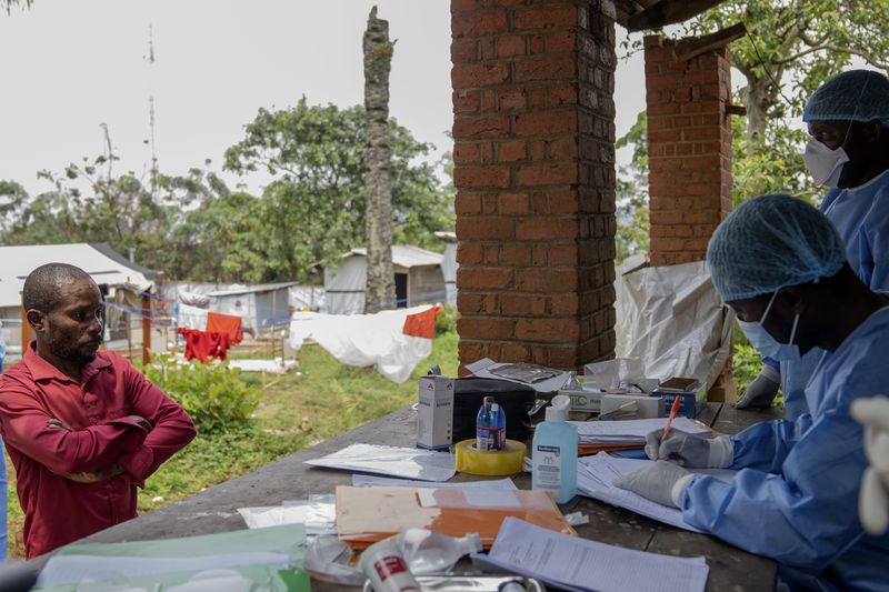 Nurse attends to man suffering from mpox at the Kamituga General Hospital in South Kivu Congo, Wednesday, Sept. 4, 2024. (AP Photo/Moses Sawasawa)