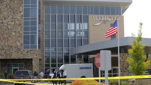 A Brinks security guard was shot outside Wellstar Cherokee Health Park in Holly Springs.