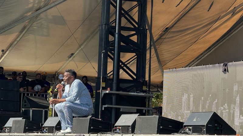 Rap icon Big Daddy Kane laughed at himself as he sweated in a powder blue Louis Vuitton outfit in Atlanta’s late October heat for ONE Musicfest on Saturday, Oct. 28, 2023. (Photo: Leon Stafford/AJC)