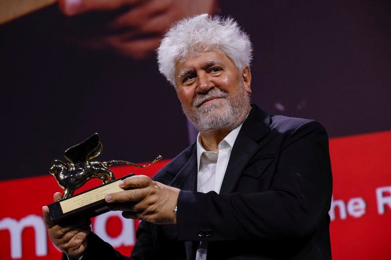 Pedro Almodovar, winner of the golden lion for best film for 'The Room Next Door', poses for photographers during the awards ceremony of the 81st edition of the Venice Film Festival in Venice, Italy, on Saturday, Sept. 7, 2024. (Photo by Joel C Ryan/Invision/AP)