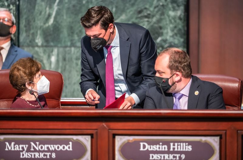 Atlanta City Councilmembers Mary Norwood, Amir Farokhi, and Dustin Hillis convene during the council's in-person meeting at City Hall on March 7, 2022. (Atlanta City Council Office of Communications)