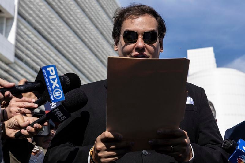 Former U.S. Rep George Santos speaks to the media outside the federal courthouse in Central Islip, N.Y. on, Monday, Aug. 19, 2024 in New York. (AP Photo/Stefan Jeremiah)