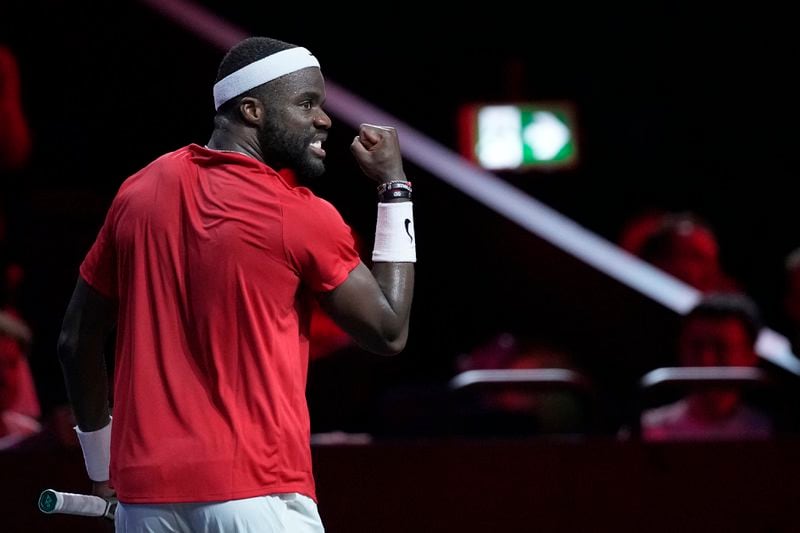 Team World's Frances Tiafoe reacts during his singles tennis match against Team Europe's Alexander Zverev on the third day of the Laver Cup tennis tournament, at the Uber arena in Berlin, Germany, Sunday, Sept. 22, 2024. (AP Photo/Ebrahim Noroozi)