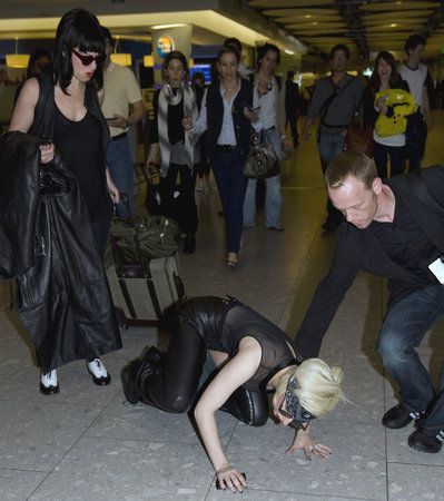 Lady Gaga falls down