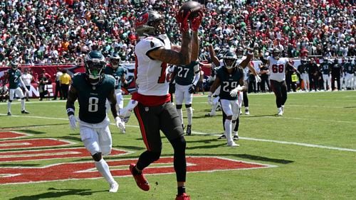 Tampa Bay Buccaneers' Mike Evans catches a touchdown pass during the first half of an NFL football game against the Philadelphia Eagles, Sunday, Sept. 29, 2024, in Tampa, Fla. (AP Photo/Jason Behnken)