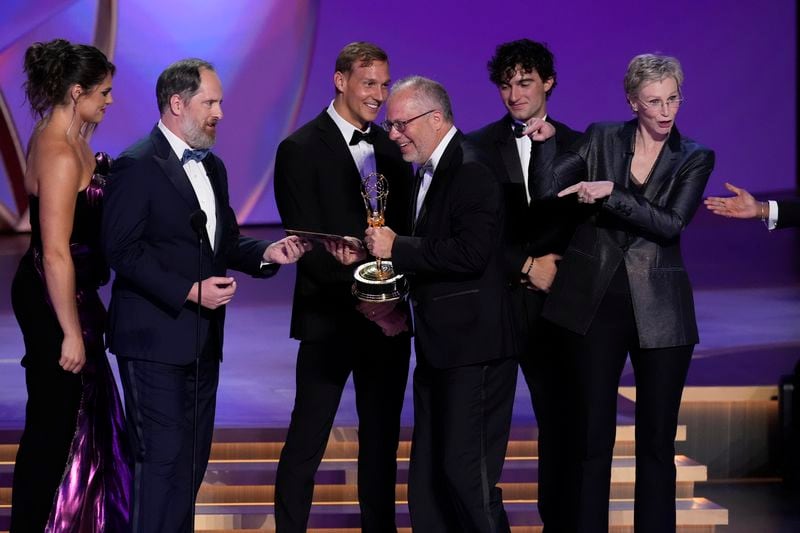 Ilona Mahler, from left, Brendan Hunt, Caeleb Dressel, Ezra Frech, and Jane Lynch present the award for outstanding directing for a drama series to Frederick E.O. Toye, center, for "Shogun" during the 76th Primetime Emmy Awards on Sunday, Sept. 15, 2024, at the Peacock Theater in Los Angeles. (AP Photo/Chris Pizzello)