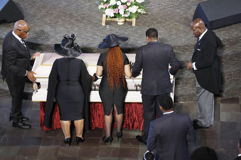 Family members of Christine King Farris stand beside her casket as celebrations begin honoring her legacy at Ebenezer Baptist Church on Sunday, July 16, 2023.
Miguel Martinez /miguel.martinezjimenez@ajc.com