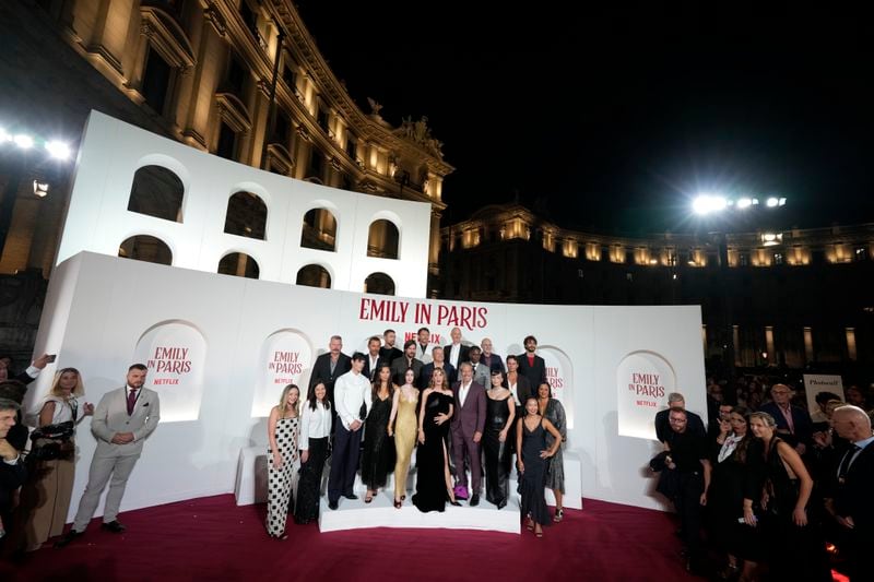 The cast of "Emily in Paris" poses before the premiere in Rome, Tuesday, Sept. 10, 2024. (AP Photo/Andrew Medichini)