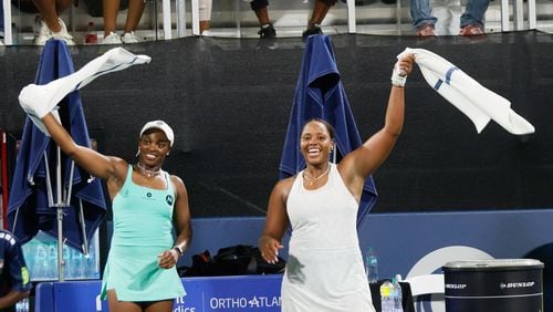 Sloane Stephens (left) and Taylor Townsend cheer for the couple in the stands who got engaged during an exhibition match at the Atlanta Open at Atlantic Station on Sunday, July 21, 2024, in Atlanta. Townsend won 7-6, 6-3.
(Miguel Martinez / AJC)