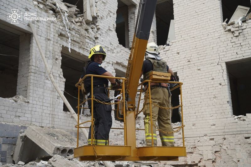 In this photo provided by the State Emergency Service of Ukraine on September 4, 2024, Rescuers work at a site of military university hit by a Russian strike in Poltava, Ukraine. (State Emergency Service of Ukraine via AP)